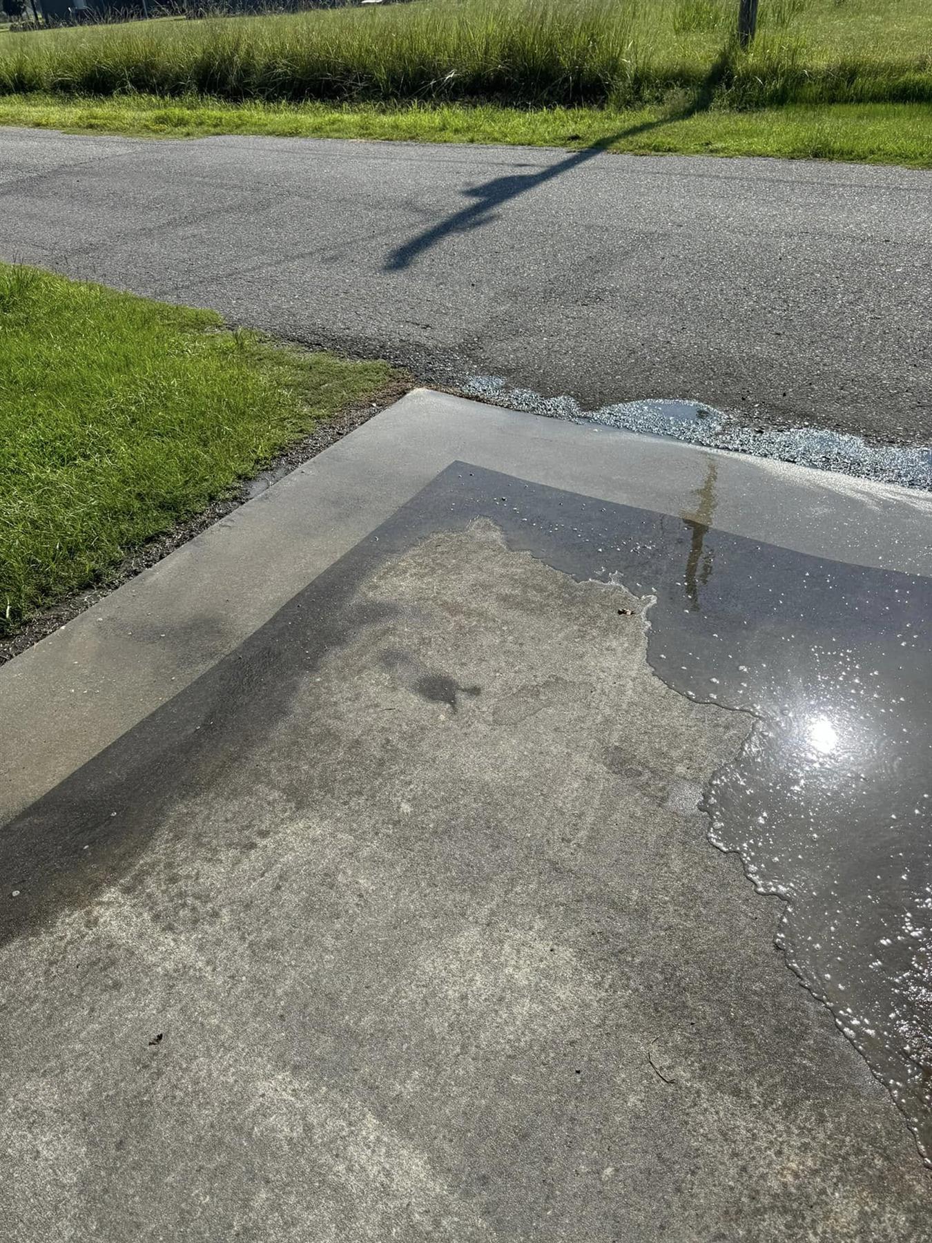 Clean driveway after pressure washing